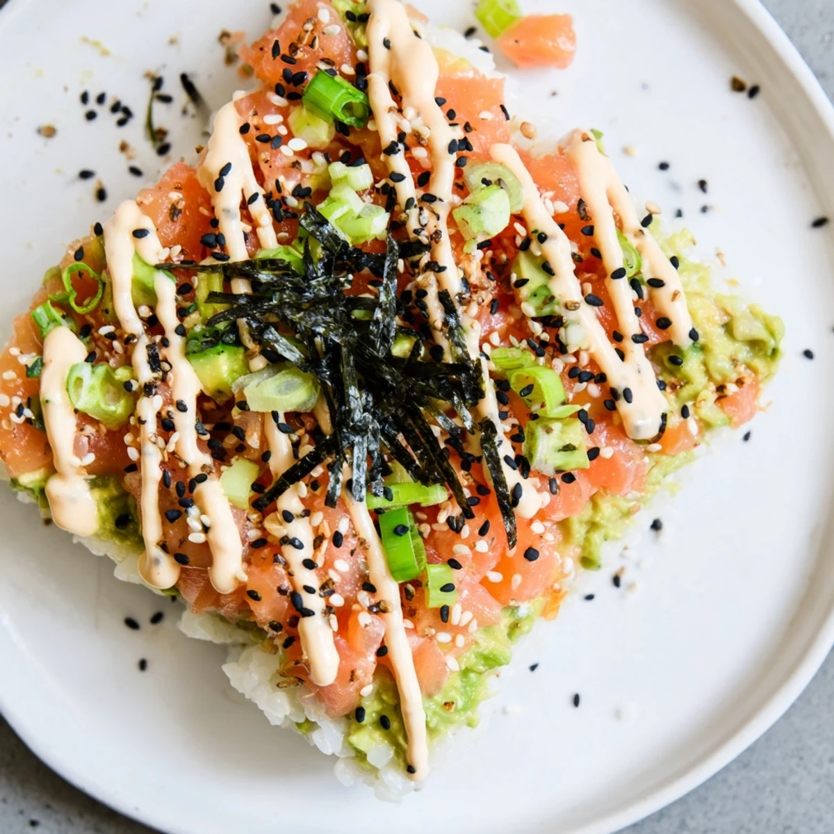 Golden and crispy rice forms the base of this Crispy Rice Salmon Stack.