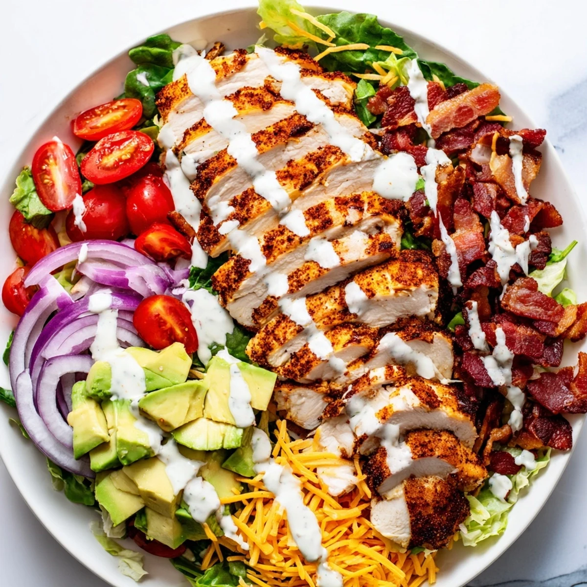 Crispy Bacon Chicken Salad with juicy chicken, smoky bacon, and creamy ranch dressing atop fresh greens.