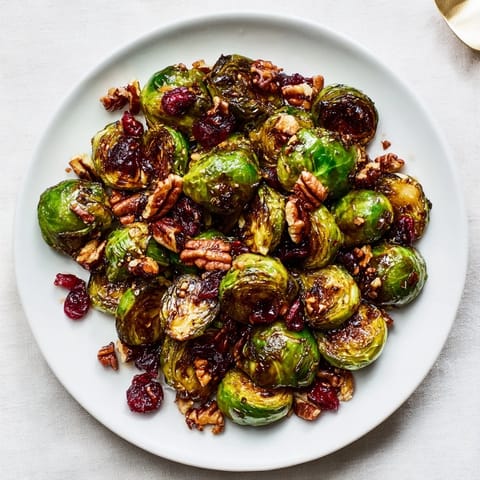 Crispy edges and a sweet glaze define these flavorful Winter Roasted Brussels Sprouts served warm.
