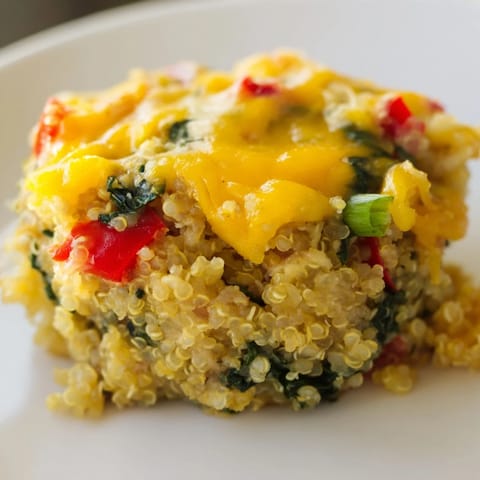 Freshly baked Baked Cheddar Quinoa Bites showcasing fluffy quinoa and melty cheddar, ready to eat.