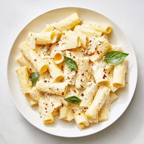A creamy blend coats the penne in this luscious Creamy Cottage Cheese Pasta, ready to savor.